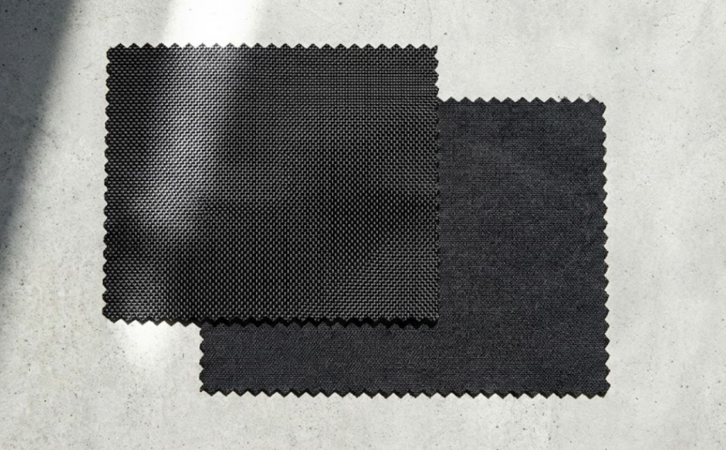 Texture contrast showing the smooth shiny finish of ballistic nylon against the rough matte surface of Cordura fabric.